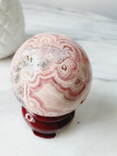 Load image into Gallery viewer, Peruvian Rhodochrosite Sphere (221g)