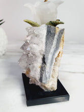 Load image into Gallery viewer, Peruvian Rhodanite Hummingbird on Quartz Cluster Base On White Jade Flower with Serpantine Leaves