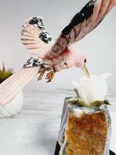 Load image into Gallery viewer, Peruvian Rhodanite Hummingbird on Quartz Cluster Base On White Jade Flower with Serpantine Leaves