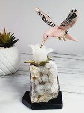 Load image into Gallery viewer, Peruvian Rhodanite Hummingbird on Quartz Cluster Base On White Jade Flower with Serpantine Leaves